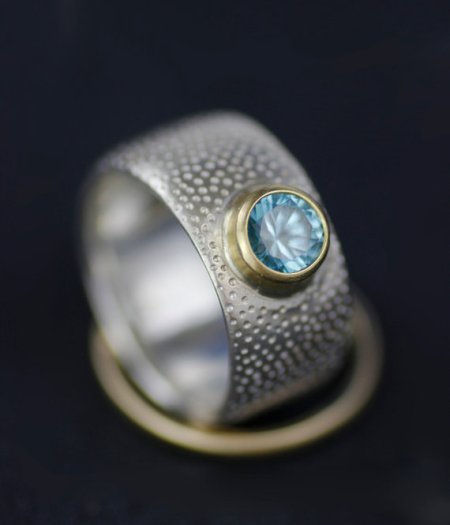lolide blue zircon and 18k gold engagement ring