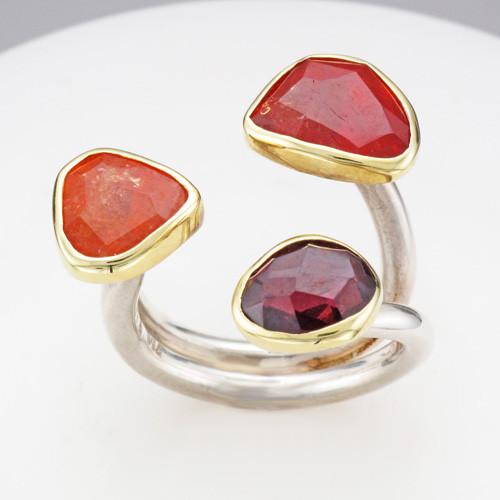 Symmetry rhodolite garnet, spessartite garnet and mandarin garnet 18k gold and sterling silver ring
