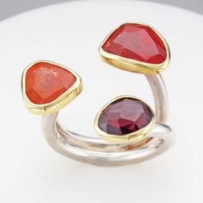 Symmetry rhodolite garnet, spessartite garnet and mandarin garnet 18k gold and sterling silver ring