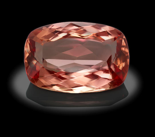 Imperial Topaz, 9.49 carats,15.62 x 10.75 x 6.31mm, Bonhams